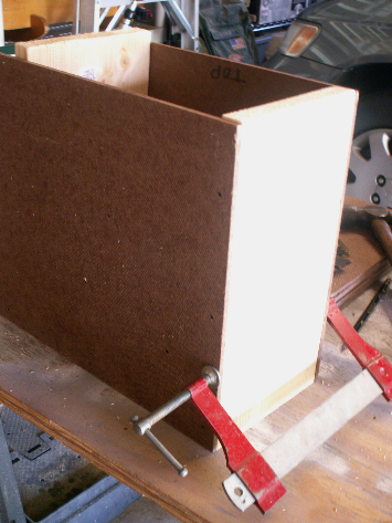 Cut the hardboard into 11 inch long pieces